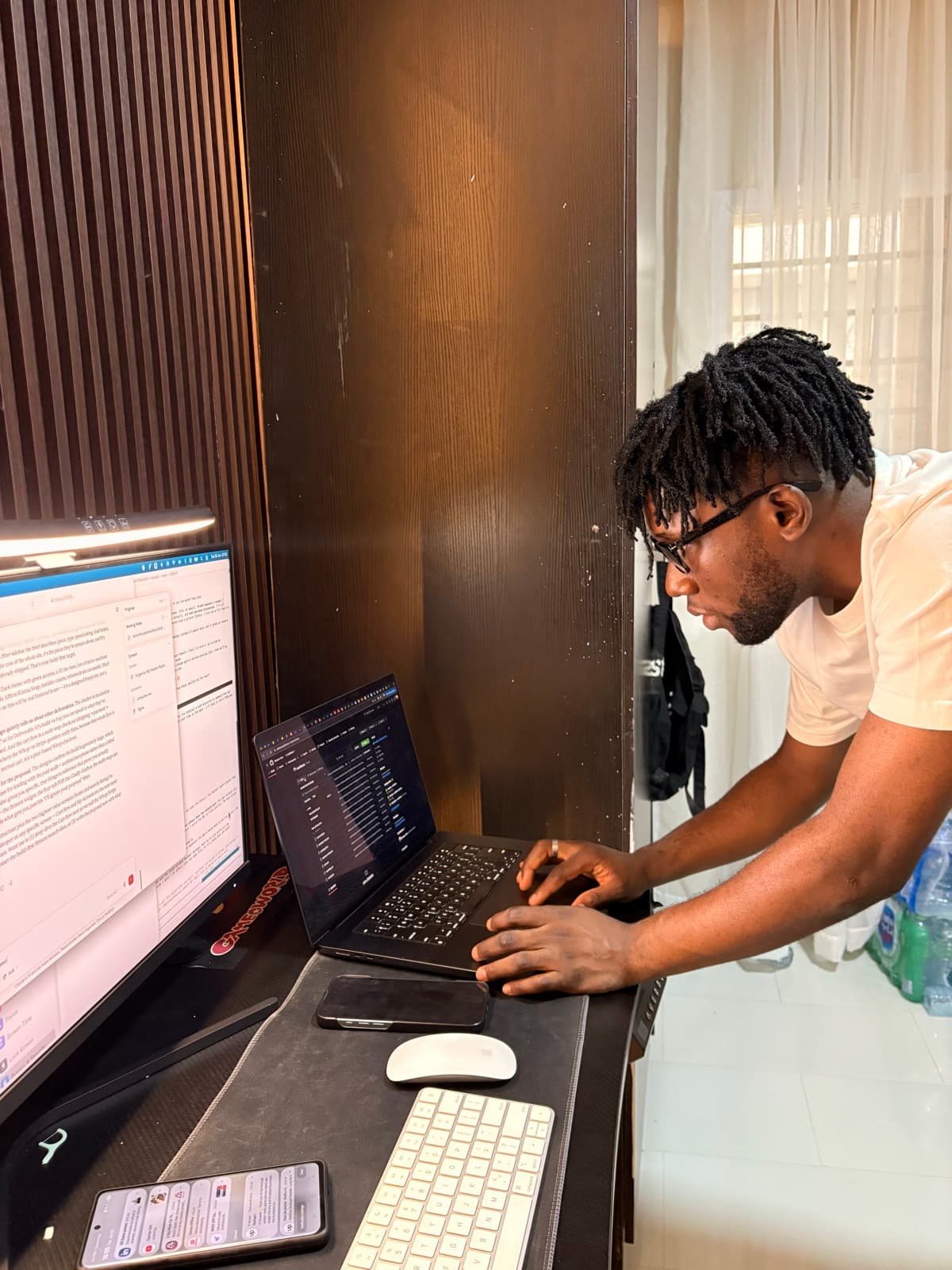 Folorunsho Ahmed Olajide building a product at his desk